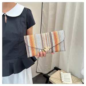 Colorful striped envelope clutch bag for women, stylish summer fashion woven hand bag.