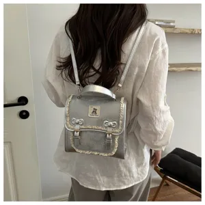 Silver girl's mini backpack with cute lace trim and bear patch detail, fashion small daypack.