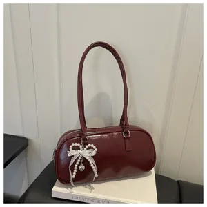 Sac porté épaule minimaliste uni pour femme style coréen avec détail de nœud de perles.