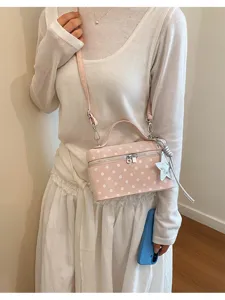 Korean style pink polka dot vanity bag detail, stylish commute crossbody box bag for women.