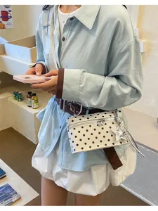 Korean style niche design polka dot crossbody box bag with cute star pendant for women.