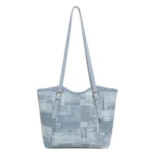 Large capacity casual shoulder tote bag, trendy light blue textured handbag for women.