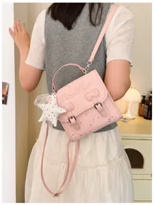 Zaino rosa carino da donna, borsa elegante con motivo a stelle, fiocco e ciondolo peluche.