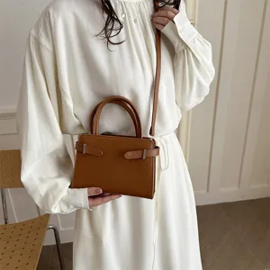 Stylish brown small square shoulder bag for women, minimalist design PU leather crossbody bag.