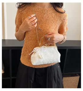 Elegant lace pearl shoulder bag, chic women's crossbody handbag with gold chain strap.