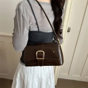 Stylish brown patent leather shoulder underarm bag for women, trendy chic small square handbag.