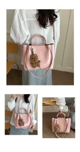 Stylish pink shoulder bucket bag with cute bear pendant, large capacity casual crossbody bag.