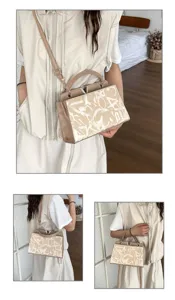Stylish women's top handle crossbody bag with geometric pattern and metal V clasp detail.