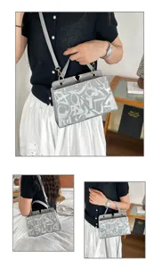 Chic grey women shoulder bag with metal V clasp and abstract pattern for daily casual wear.