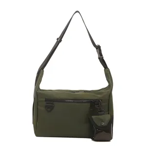 Army green nylon messenger bag with adjustable strap, front zip pocket and small detachable pouch.