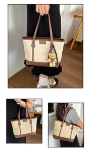 Stylish woven tote bag for women, large capacity shoulder handbag with cute bear pendant.