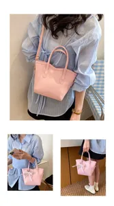 Women's pink leather bucket bag, stylish top-handle shoulder crossbody bag for daily wear.