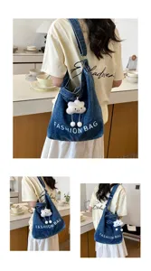 Japanese style denim shoulder bag large capacity casual crossbody tote with cute cloud pendant.