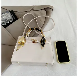 Elegant white women shoulder bag with stylish scarf handle, perfect for daily commute and casual use.