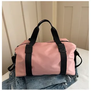 Pink travel duffel bag for women, short trips and gym fitness yoga storage utility.