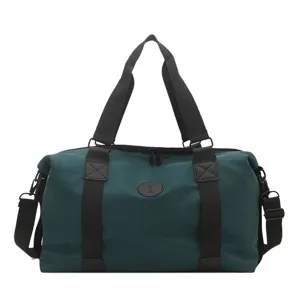 Dark green travel duffel bag for women, portable casual gym fitness bag with shoulder strap.