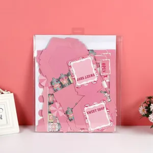 Detailed view of kids birthday party disposable 3-tier paper cake stand components in pink.