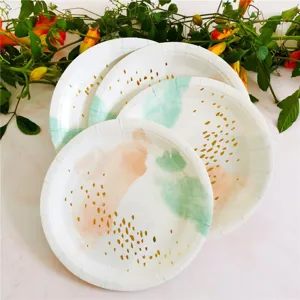 Disposable paper plates with watercolor gold foil details, perfect for birthday parties and picnics.