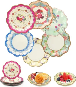 Detailed view of vintage floral paper plates, scalloped edge disposable tableware for party.