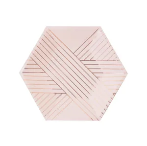 Close-up detail of hexagonal pink paper plate with elegant rose gold geometric line pattern.