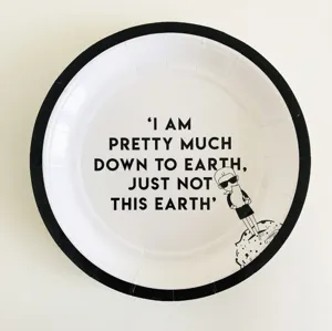 Disposable paper plates with quotes and cartoon print, black and white party tableware set.