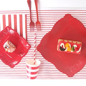 Red embossed square disposable paper plates and party tableware set for party events.