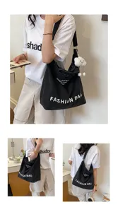 Casual Japanese canvas shoulder bag, large capacity crossbody tote for students and daily commuting.