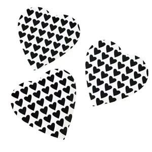 Disposable paper plates with black heart pattern, perfect for birthday parties and events.