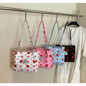 Cherry print canvas shoulder bag with chain strap, large capacity stylish tote for women.