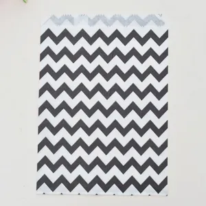 Detailed view of black and white chevron paper greaseproof snack bag for food packaging.