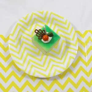 Disposable yellow and white chevron paper plates for kids birthday party and celebration events.