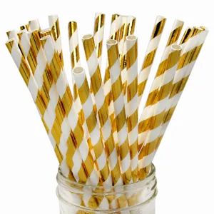 Gold striped paper straws detail view, perfect for parties, eco-friendly disposable tableware.