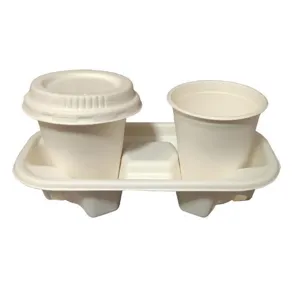 Support de gobelet double en pulpe biodégradable avec tasses pour boissons à emporter.