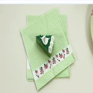 Green polka dot rose print paper napkins for kids birthday party decoration table setup