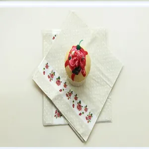 Decorative rose print paper napkins for children birthday party table decoration.
