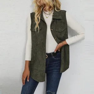 Close-up detail of the dark green corduroy vest, featuring lapel collar and buttons.