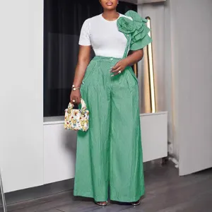 Completo donna due pezzi maglietta a maniche corte a righe e pantaloni larghi eleganti