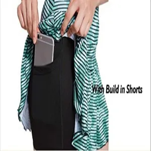 Womens athletic tennis golf skort with built in shorts and pocket for active workout sport.