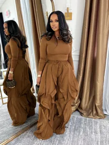 Women's two-piece casual set featuring a slim-fit long sleeve top and ruffle wide leg pants.