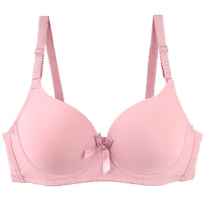 Pink seamless push-up bra for women, smooth daily wear undergarment with comfortable straps.