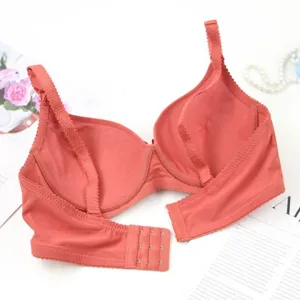 Detail view of seamless solid color push up women bra back strap and hook closure design.