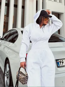 Women solid color hooded long sleeve jumpsuit casual fashion winter outfit detail shot.