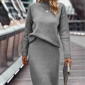 Stylish women's two-piece knit set with long sleeve turtleneck sweater and midi skirt.