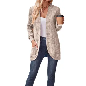 Detailed view of the casual ribbed knit cardigan sleeve and pocket, cozy autumn texture.