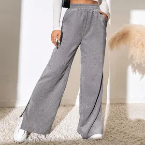 Women's high waist solid color corduroy wide leg pants casual split hem long trousers.