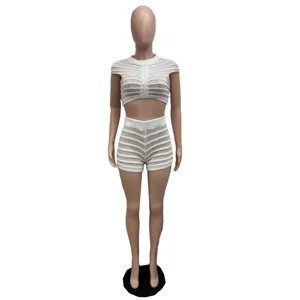 Detailed view of the stylish knit crop top and high-waist shorts two-piece set outfit.