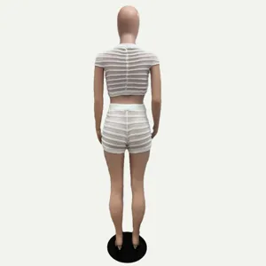 Back view detail of women white knitted crop top and slim shorts two piece set texture.