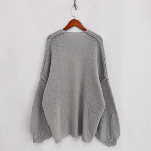 Casual loose V-neck solid color knit cardigan sweater for women, comfortable daily autumn wear.