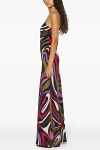 Elegant satin slip maxi dress featuring vibrant abstract swirl print, backless and side slit.