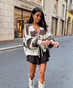Women's casual oversized colorblock striped knitted cardigan sweater, cozy autumn fashion apparel detail shot.
